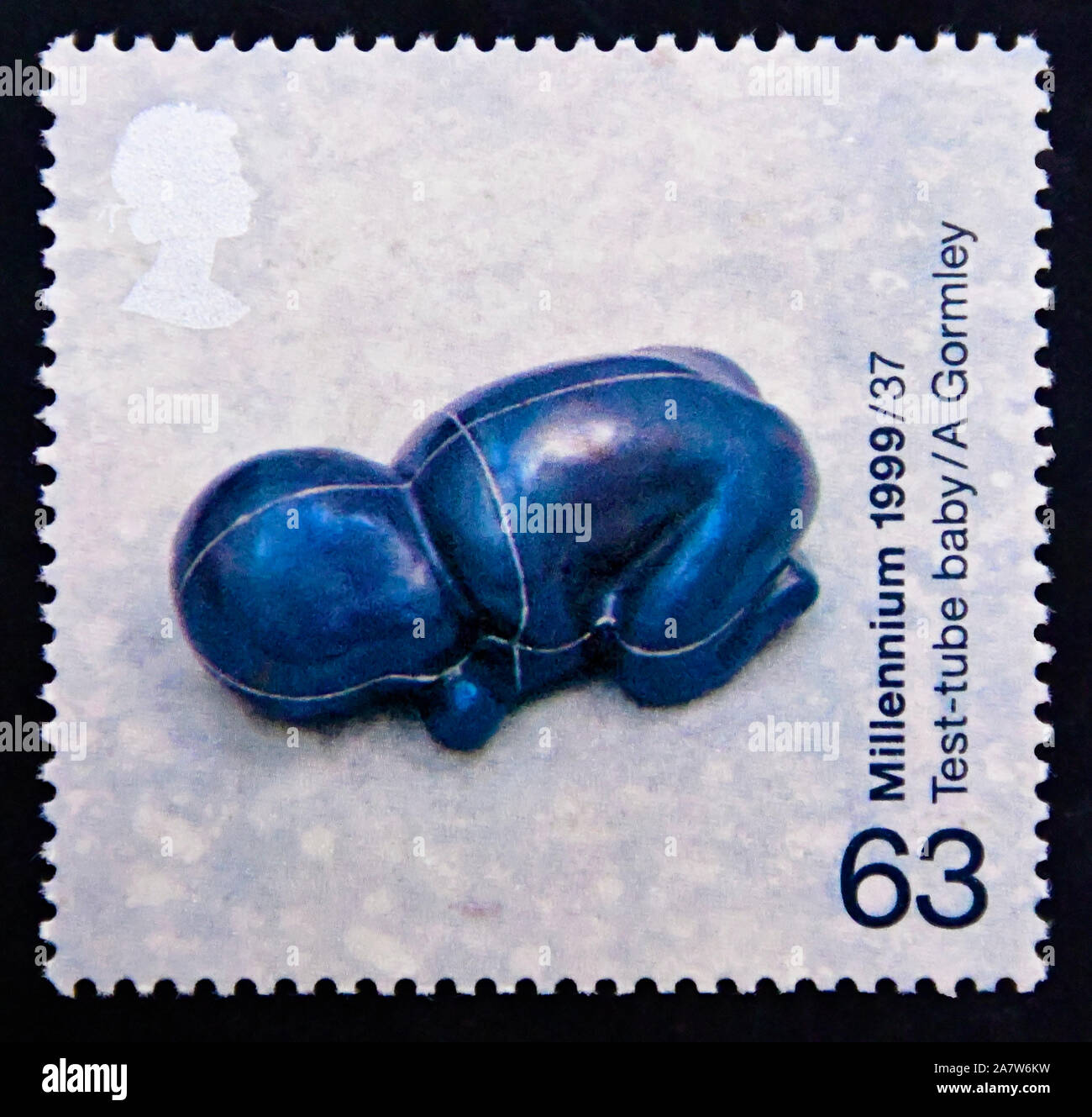 Postage stamp. Great Britain. Queen Elizabeth II. Millennium Series. The Patients' Tale. Sculpture of Test-tube Baby. Stock Photo