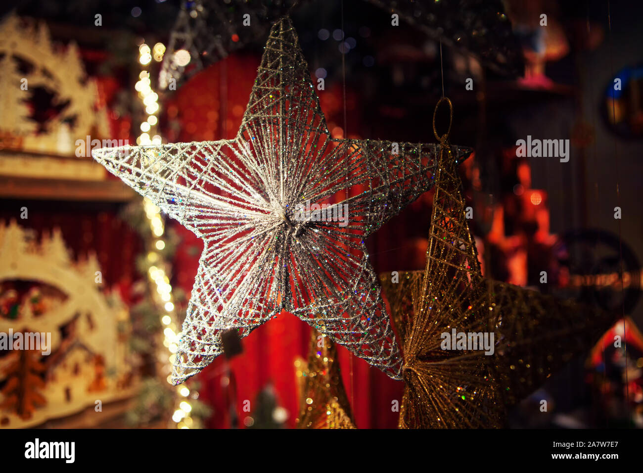 Silver star decoration for Christmas tree Stock Photo - Alamy