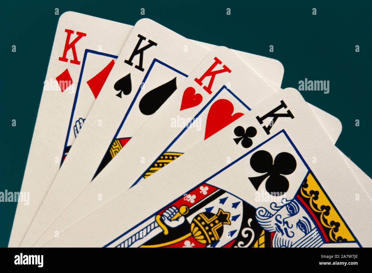 combination of four different play cards Stock Photo Alamy