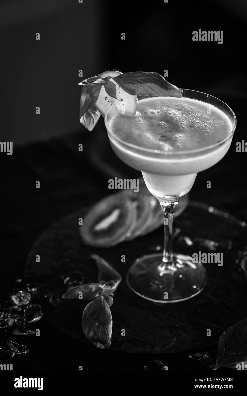 kiwi cooler cocktail with fresh fruits & basil Stock Photo Alamy