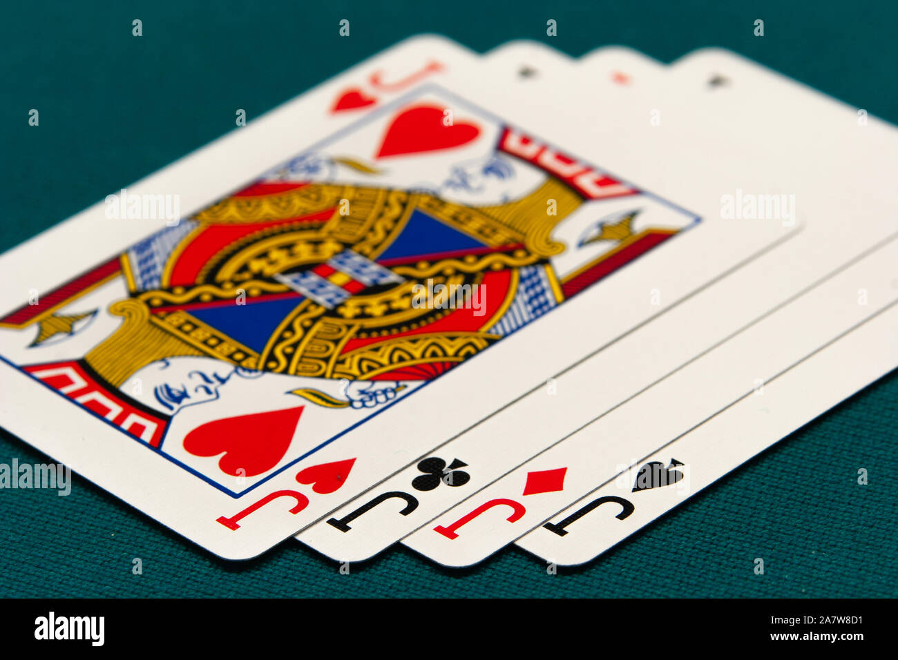 combination of four different play cards Stock Photo Alamy
