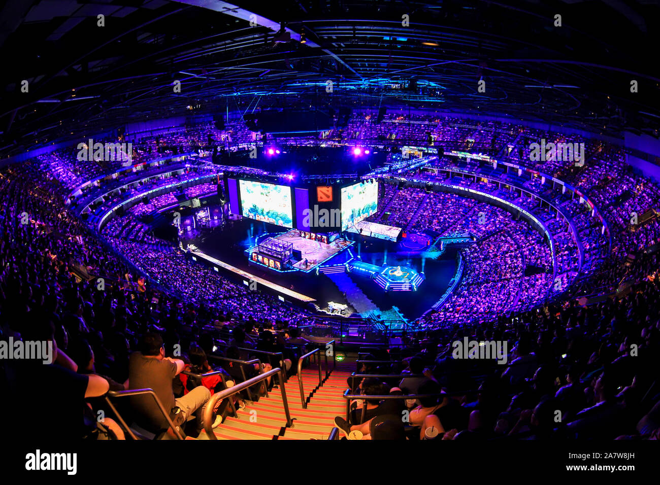 Players compete in the Dota 2 International game during the TI9 grand final match in Shanghai, China, 25 August 2019.   An unforgettable Dota 2 Intern Stock Photo