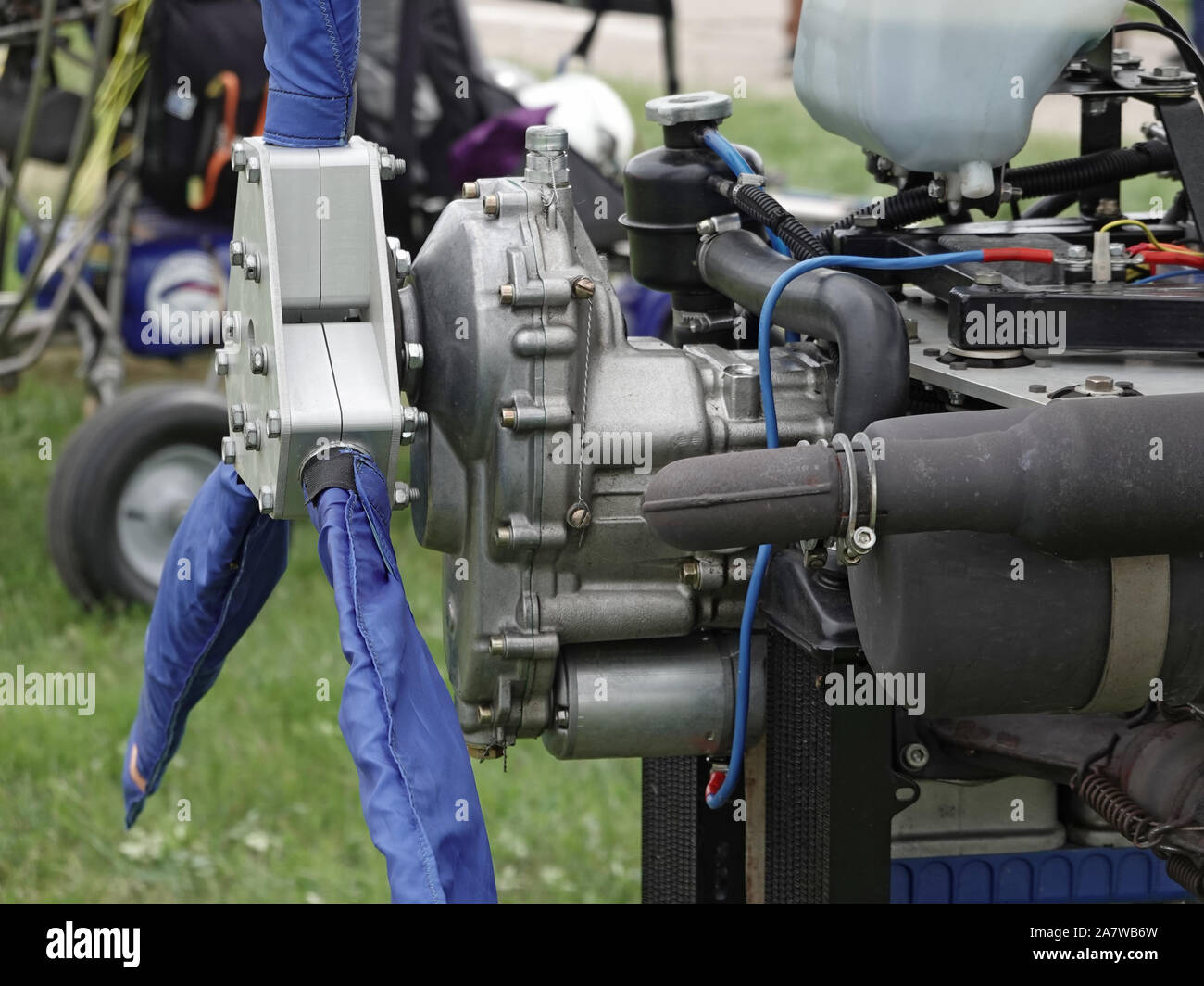 Aircraft piston engine with a three-blade blue propeller. Stock Photo