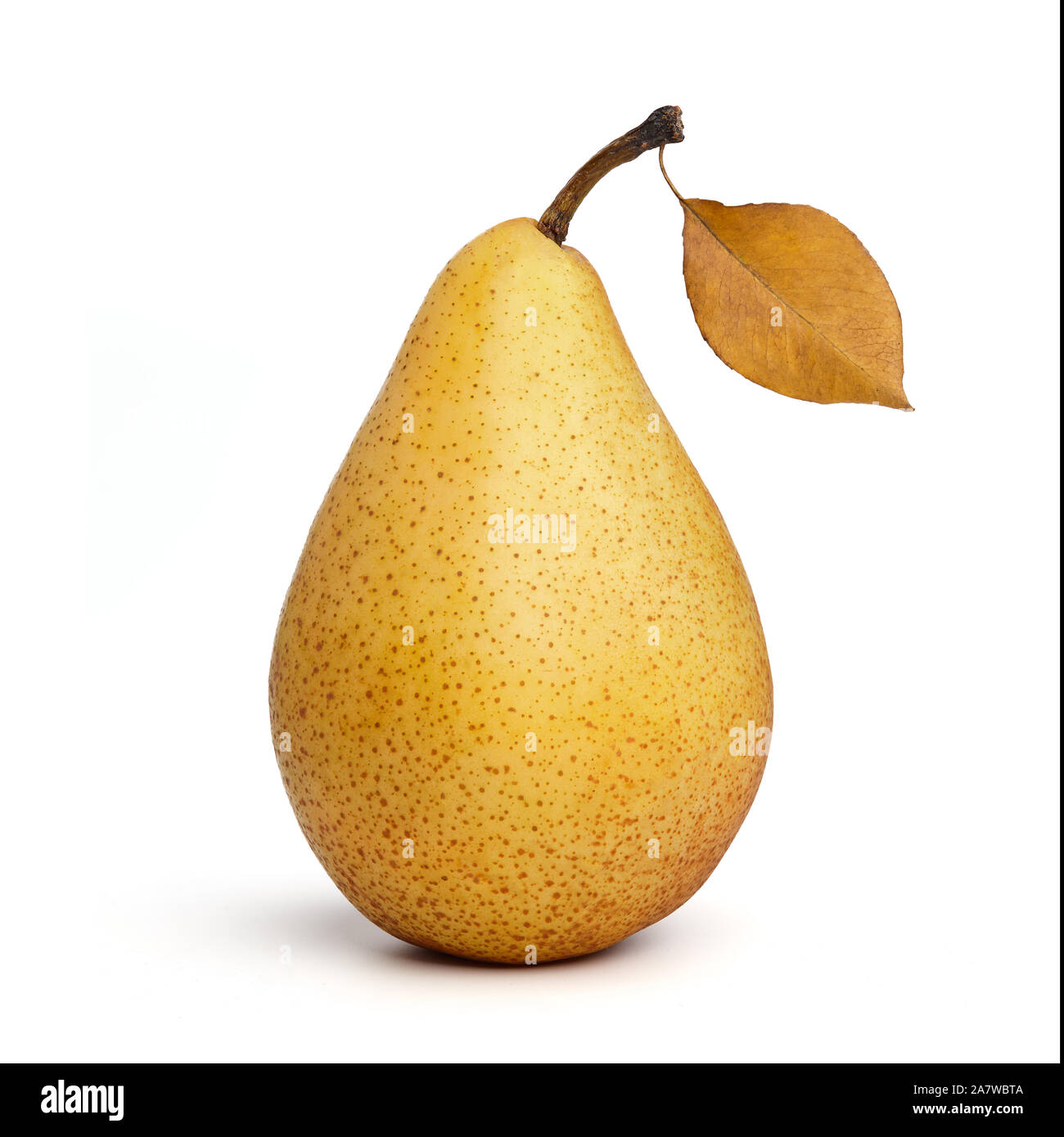 Yellow pear with leaf isolated on white background Stock Photo
