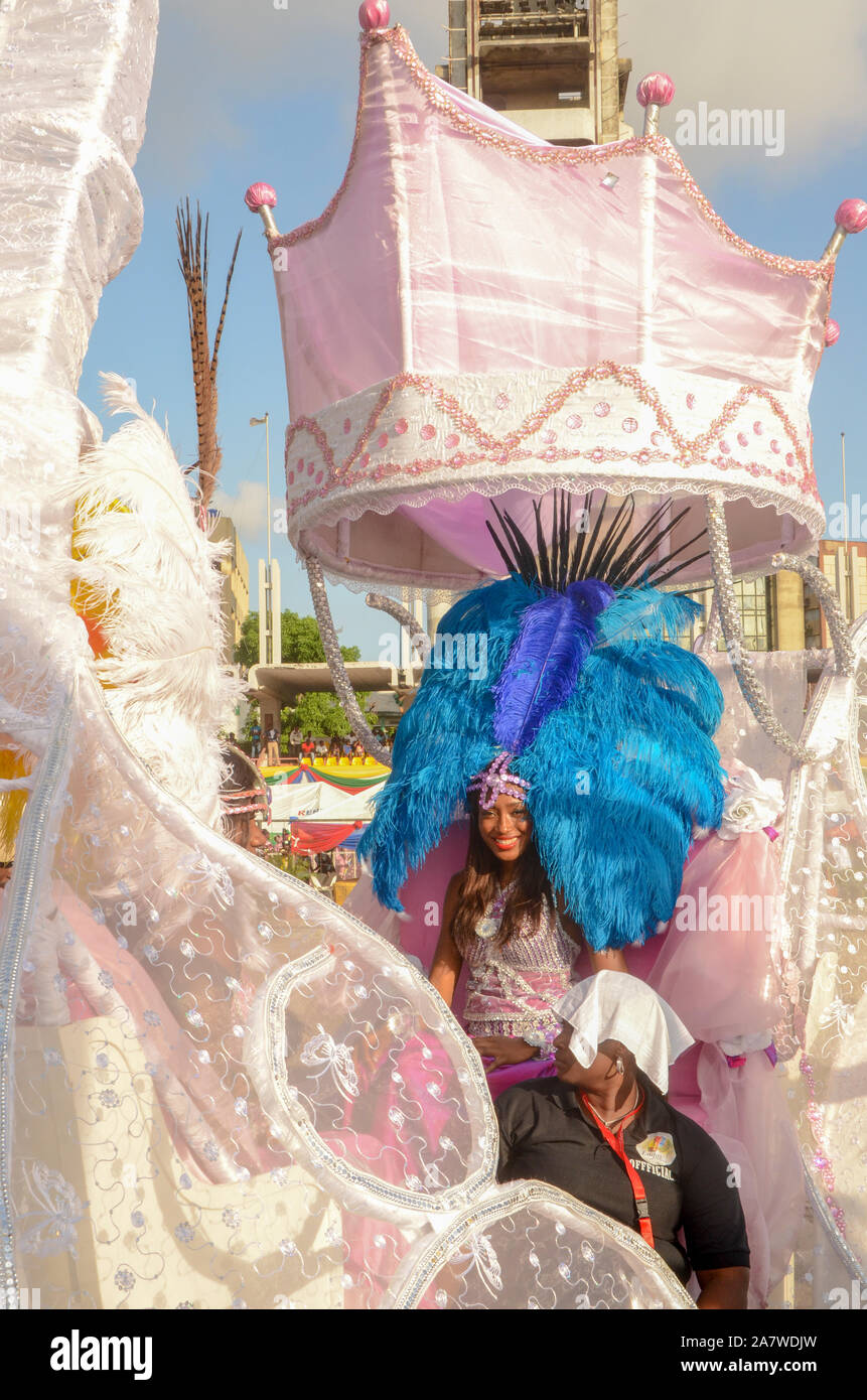 A Nigerian beautiful queen smiling inside her crafted chariot during the Lagos Carnival. Stock Photo