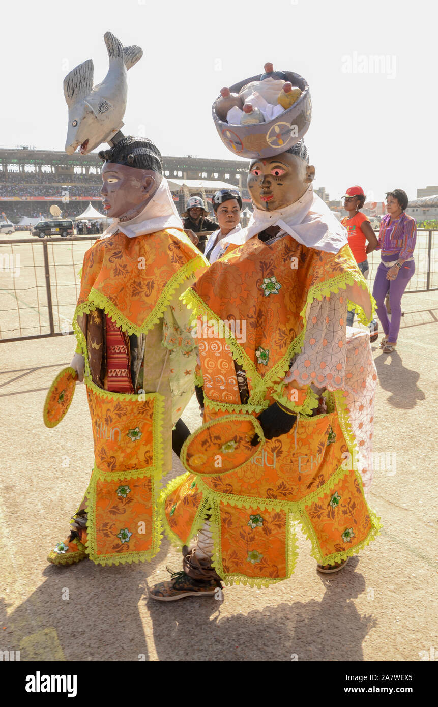 Young Gelede Maskers garbage in their beautiful costumes parading the streets of Lagos during the annual Lagos Carnival which hosted millions of tourists into the country annually. Stock Photo
