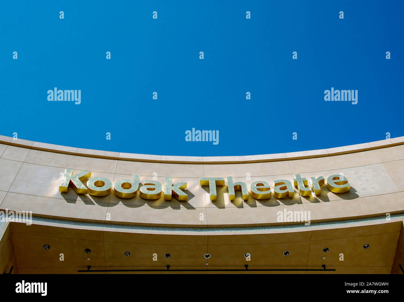LOS ANGELES, CALIFORNIA, USA - MARCH 2009: Exterior view of sign on the front of the Kodak Theatre in Hollywood against a deep blue sky Stock Photo