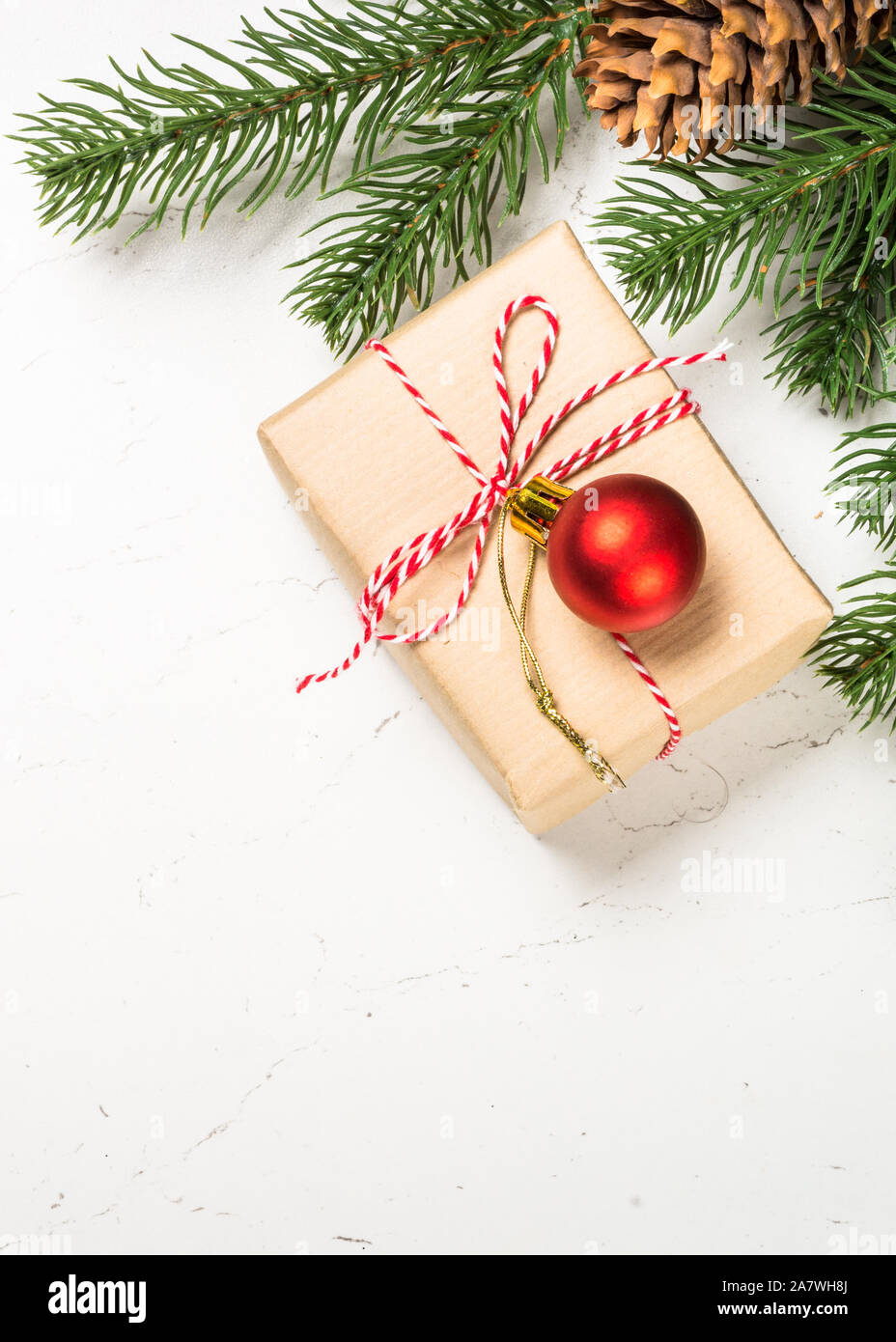 Christmas background with fir tree and decorations on white Stock Photo ...