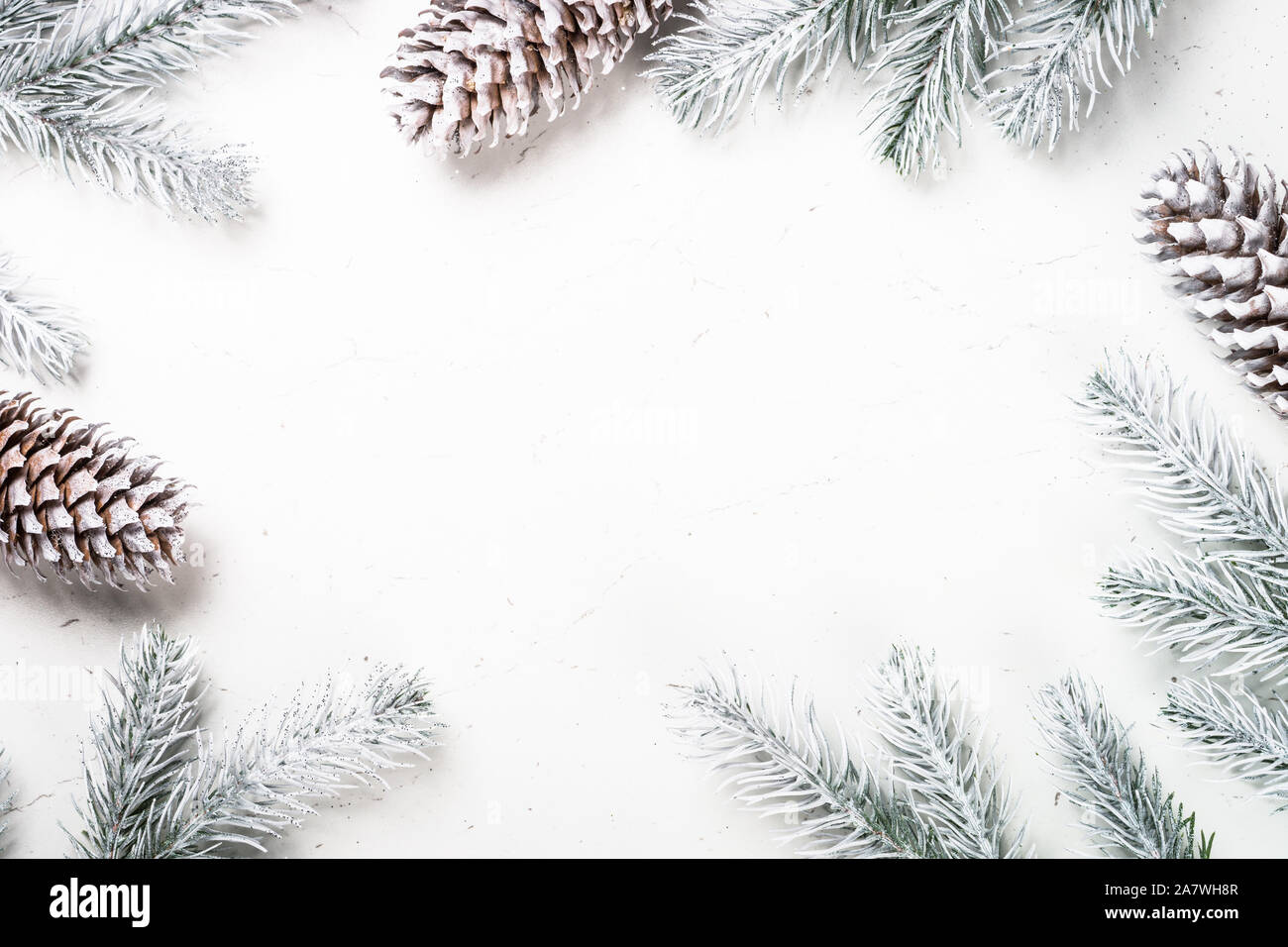 Christmas background with fir tree and decorations on white Stock Photo ...
