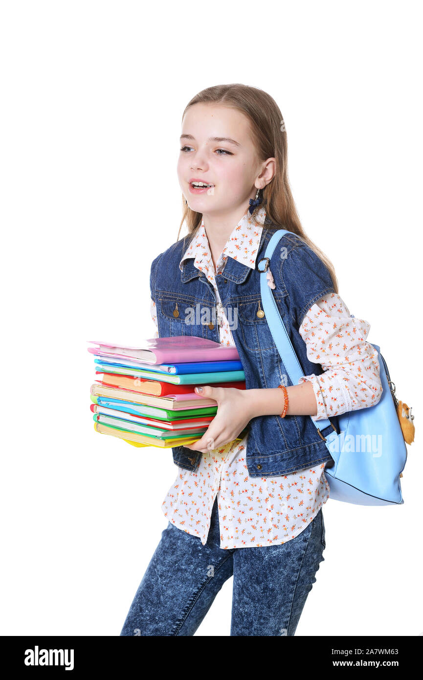 Happy schoolgirl posing with books isolated on white background Stock ...