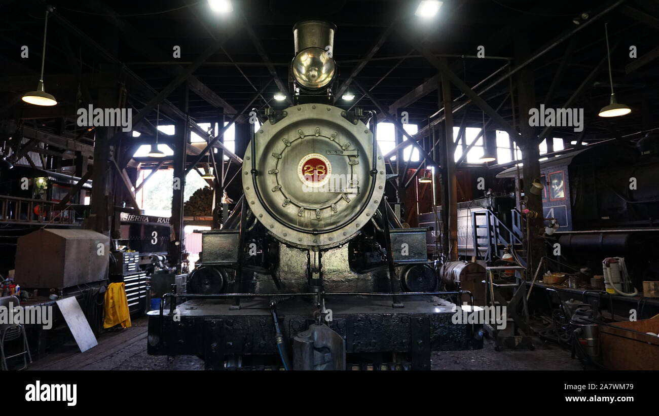 Sierra Railway 28, steam locomotive built in 1922, parked in the Jamestown roundhouse at Railtown 1897 State Historic Park, Jamestown, California. Stock Photo
