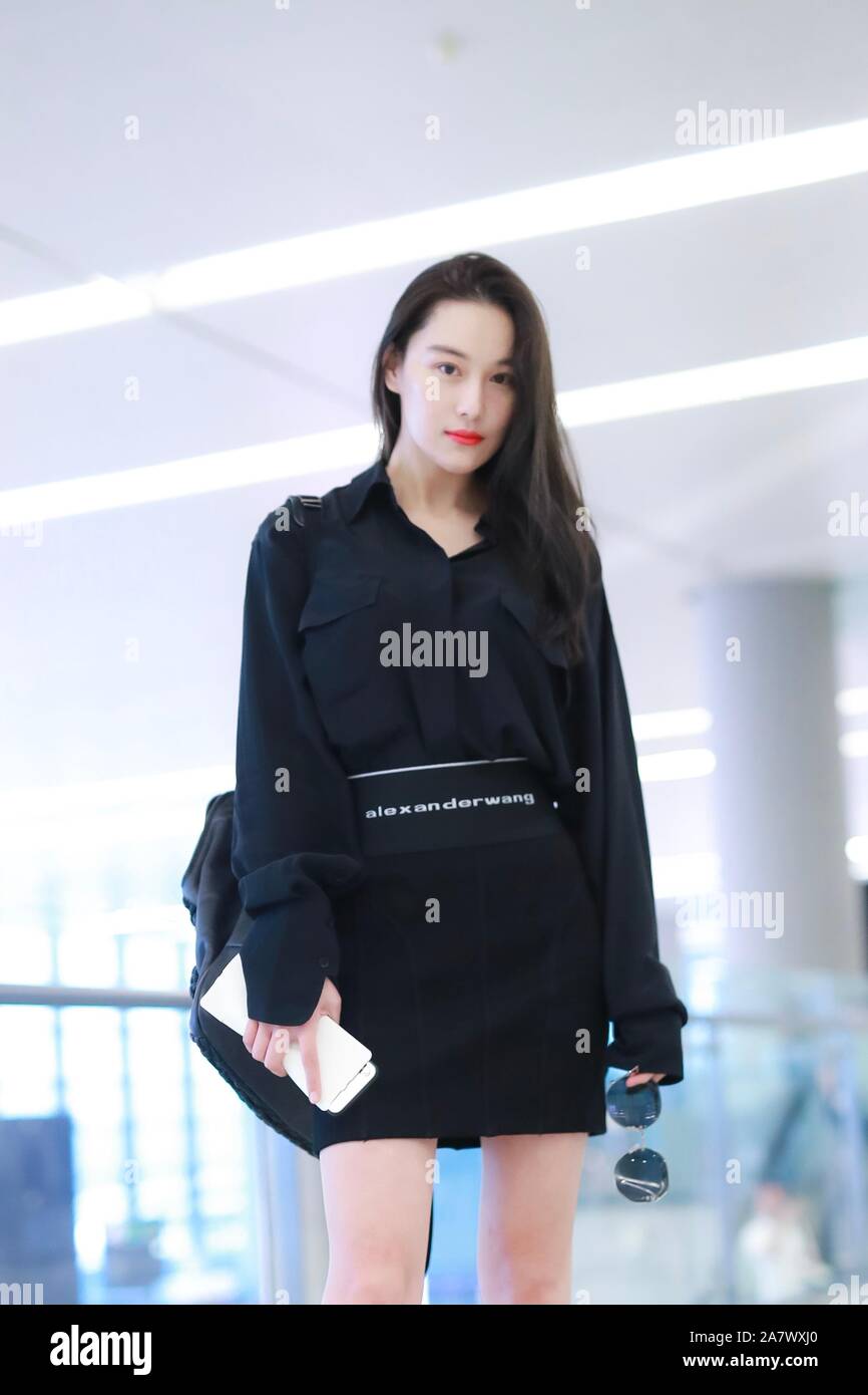Chinese actress, singer and model Zhang Xinyu, also known as Viann Zhang,  shows up at an airport in Shanghai, China, 14 August 2019. Skirt: Alexander  Stock Photo - Alamy