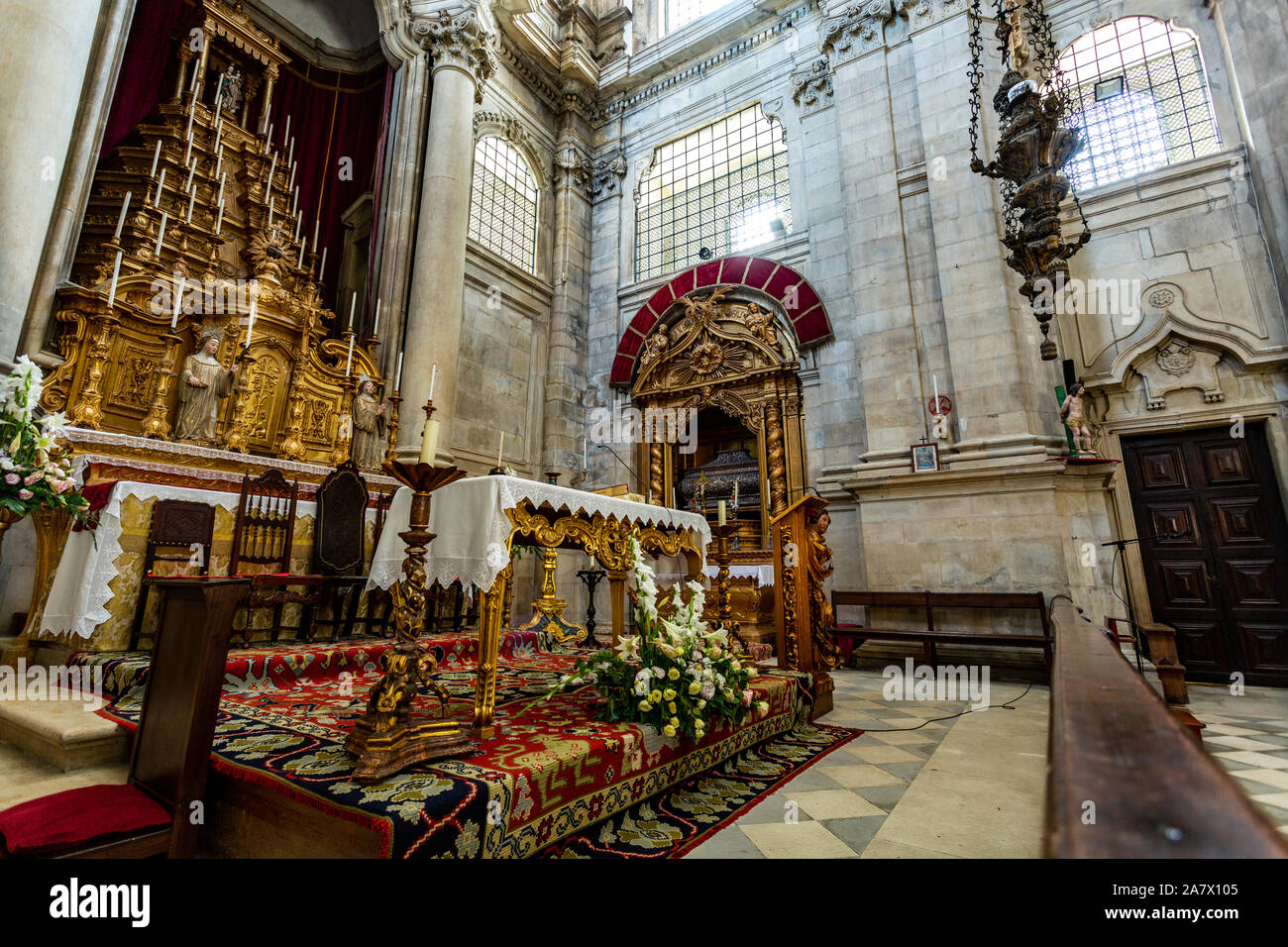 View of the Baroque and Neoclassical main chapel and altar with the tomb of the Blessed Sancha in the background of the Church of the Monastery of Sai Stock Photo