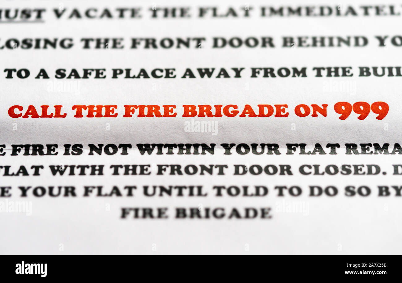 Instructions leaflet distributed to residents of a block of flats in case of a fire - call the fire brigade on 999 Stock Photo
