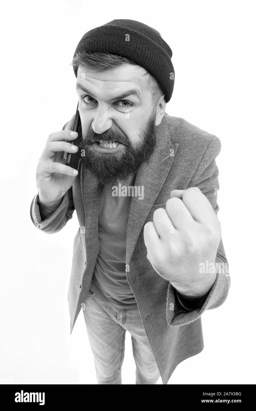 Mobile call concept. Man bearded hipster hold mobile phone white background. Stylish guy use mobile phone. Difficulties mobile communication. Hipster smartphone call friend. Important conversation. Stock Photo