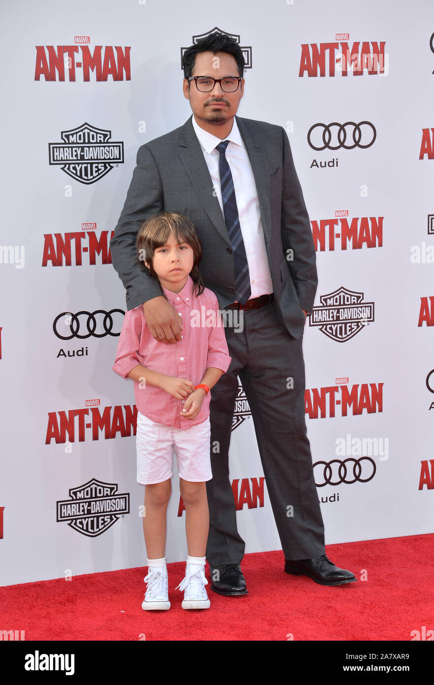 LOS ANGELES, CA - JUNE 29, 2015: Actor Michael Pena & son at the world premiere of his movie 'Ant-Man' at the Dolby Theatre, Hollywood. © 2015 Paul Smith / Featureflash Stock Photo