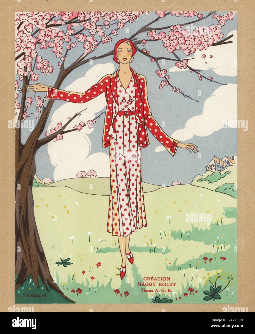 Woman in ensemble of jacket and dress in reverse pink and red polka dots standing in a field under a tree in blossom. Illustration by J. Tiercelin. Handcolored pochoir (stencil) lithograph from the French luxury fashion magazine Art, Gout, Beaute, 1931. Stock Photo