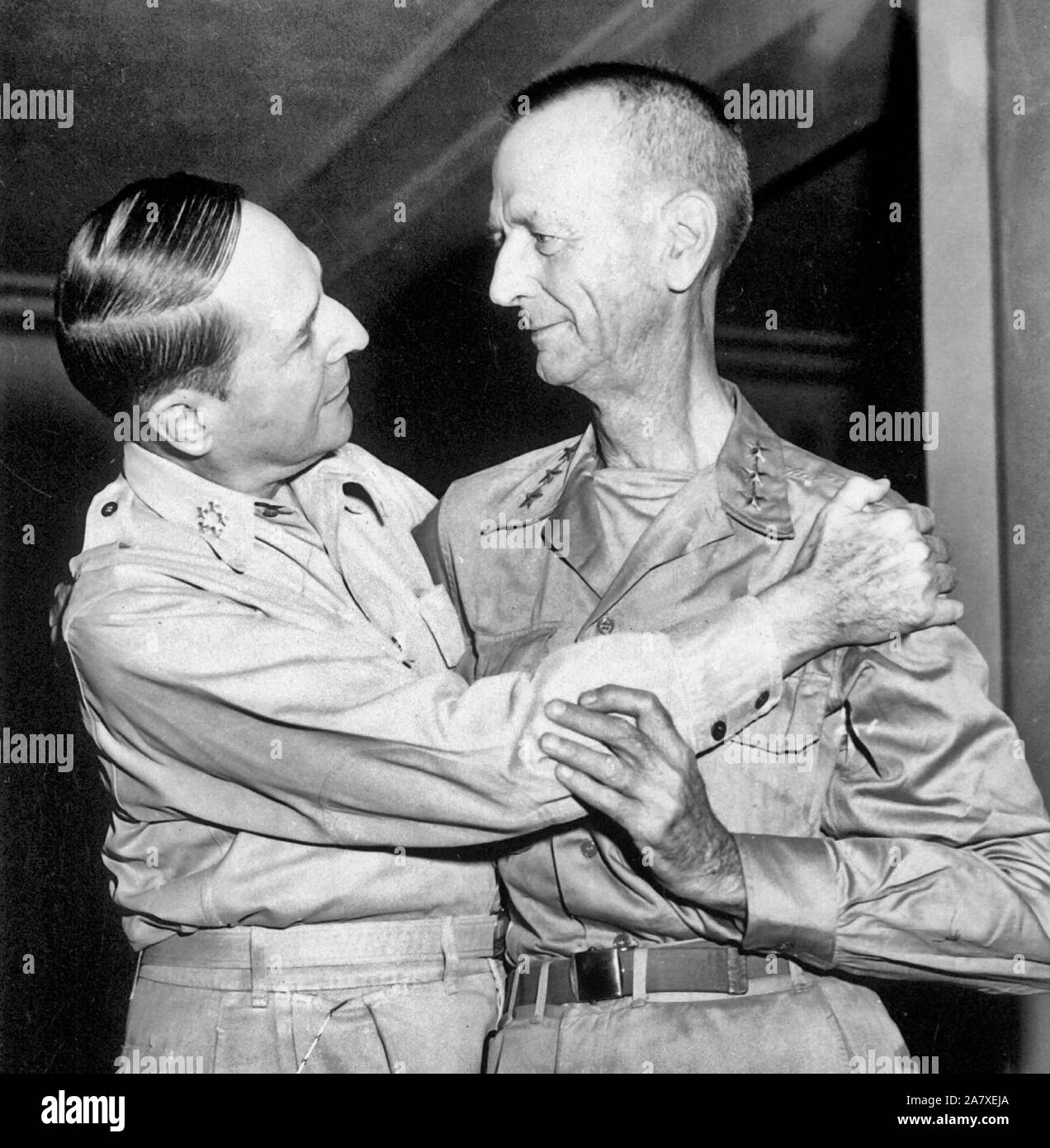 General of the Army Douglas MacArthur and Lt. Gen. Jonathan Wainwright greet each other at the New Grand Hotel, Yokohama, Japan on August 31, 1945, in their first meeting since they parted on Corregidor more than three years before. Stock Photo