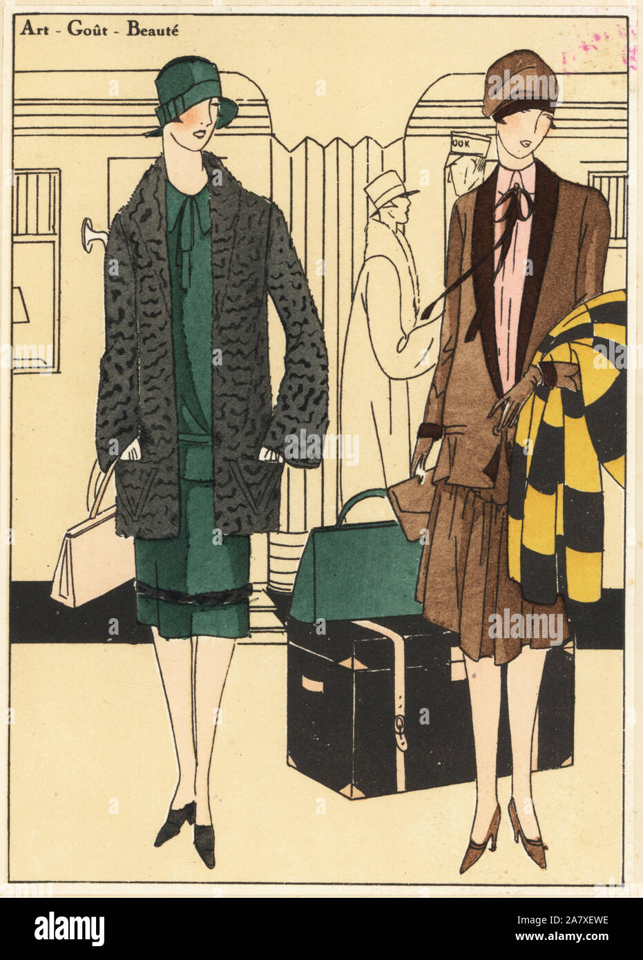 Women on a station platform with travel bags. One wears a sports ensemble in green wool and pony, and the other a visiting dress in ottoman bannelon and velvet. Handcolored pochoir (stencil) lithograph from the French luxury fashion magazine Art, Gout, Beaute, 1926. Stock Photo