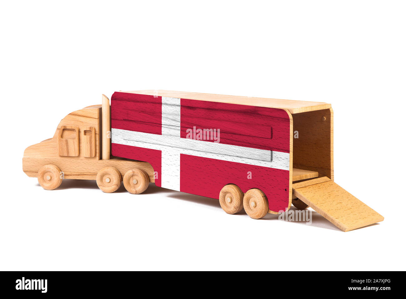 Close-up of a wooden toy truck with a painted national flag Denmark. The concept of export-import,transportation, national delivery of goods Stock Photo