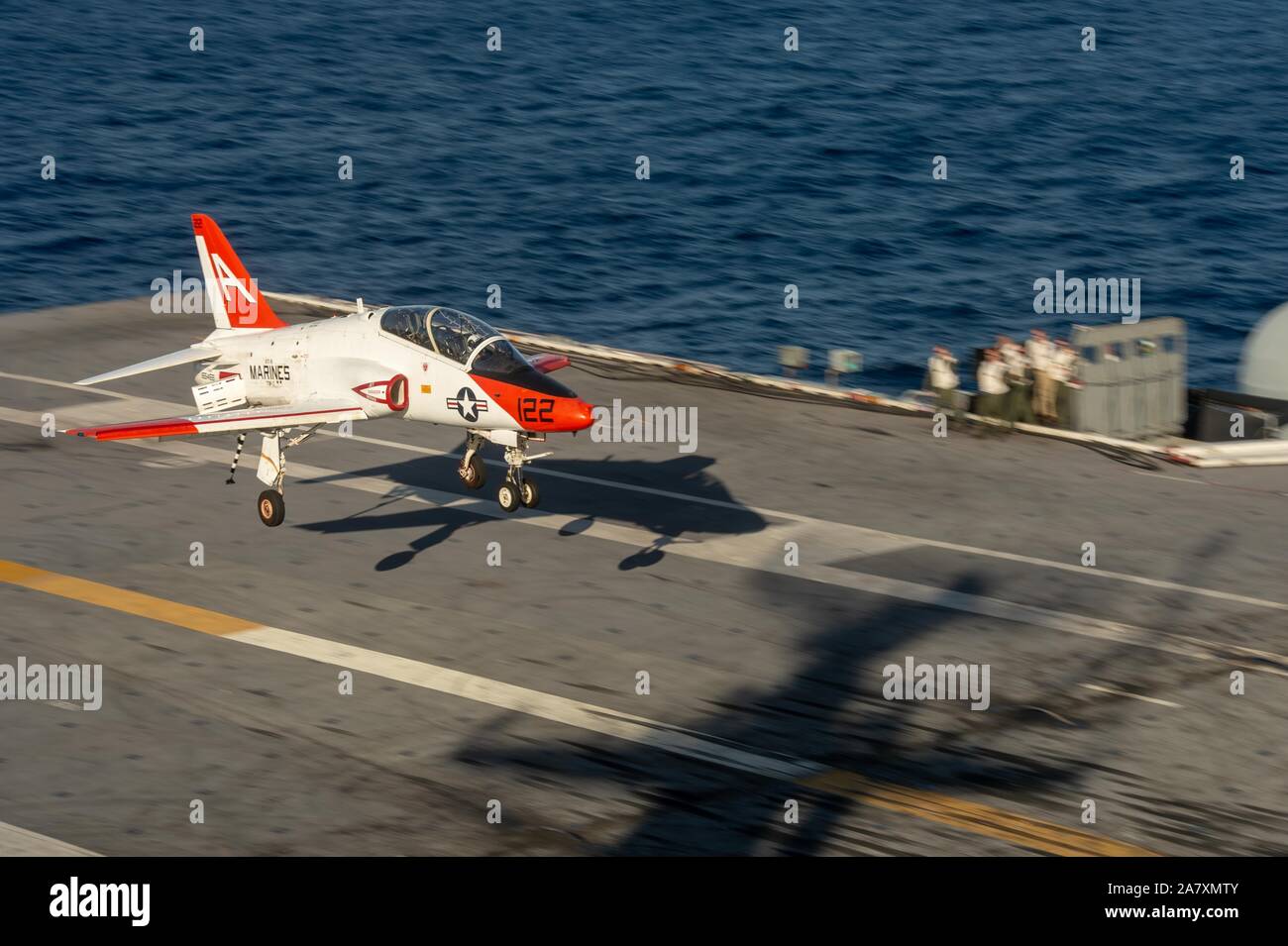 A T-45C Goshawk training aircraft, assigned to Training Air Wing (TW) 1, prepares to land on the flight deck of the aircraft carrier USS John C. Stennis (CVN 74) in the Atlantic Ocean, Nov. 2, 2019. The John C. Stennis is underway conducting routine operations in support of Commander, Naval Air Force Atlantic. (U.S. Navy photo by Mass Communication Specialist Seaman Thomas R. Pittman) Stock Photo