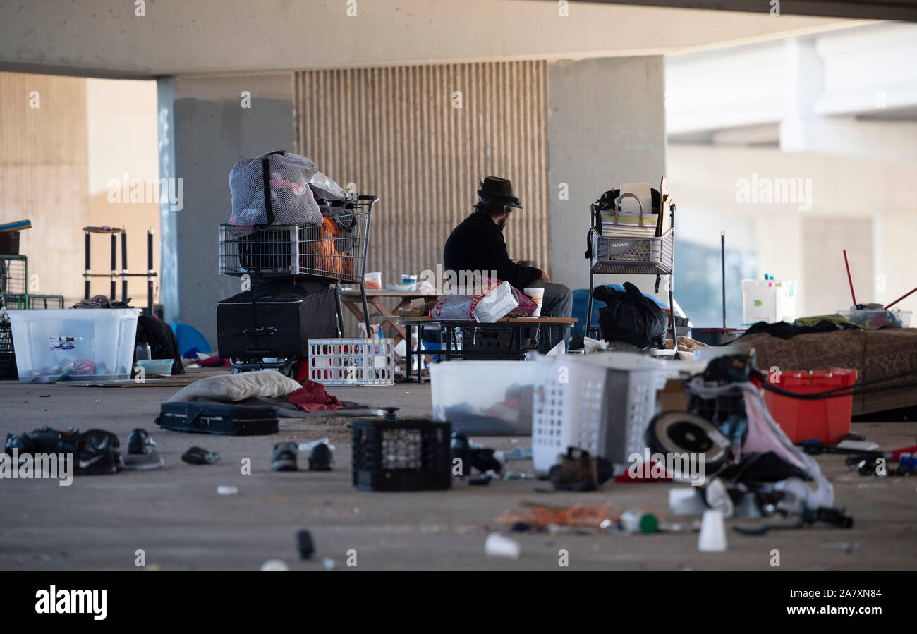 Homeless Texan prepares to leave temporary encampment under highway ...