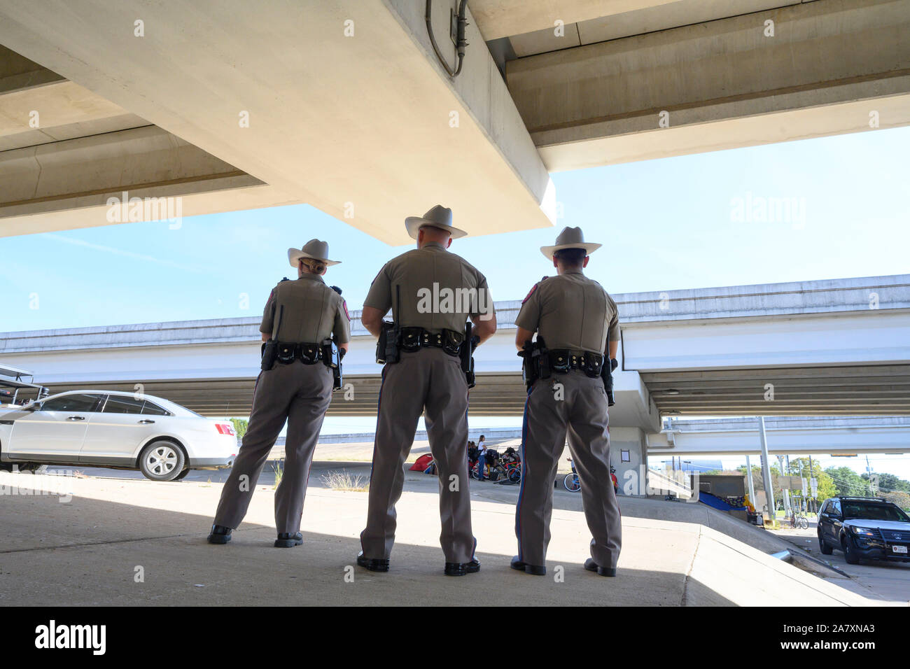 Texas state troopers watch Texas Department of Transportation