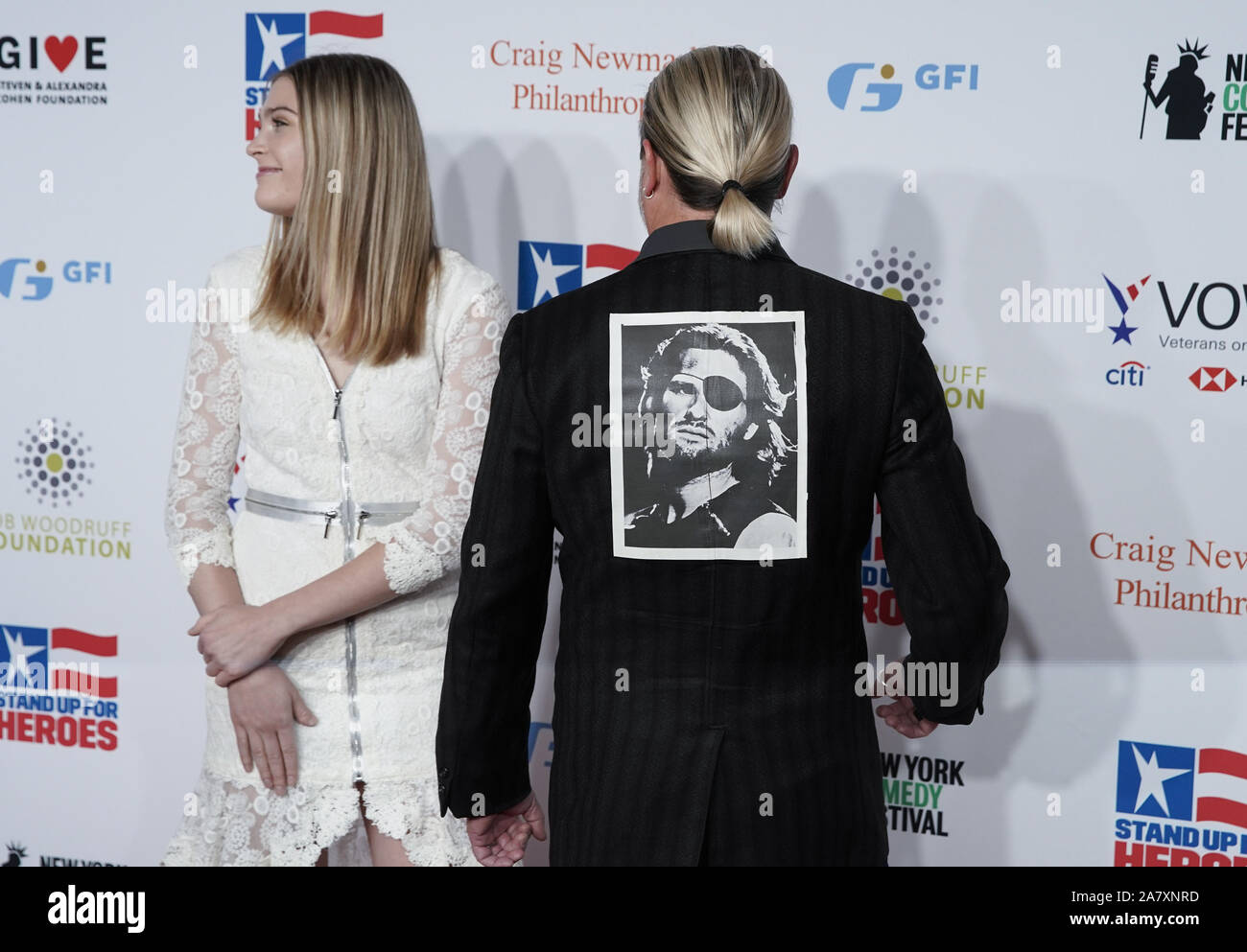 New York, United States. 04th Nov, 2019. A guest arrives on the red carpet with a picture of fictional character Snake Plissken on his jacket at the 13th annual Stand Up for Heroes to benefit the Bob Woodruff Foundation at The Hulu Theater at Madison Square Garden on Monday, November 4, 2019 in New York City. Photo by John Angelillo/UPI Credit: UPI/Alamy Live News Stock Photo