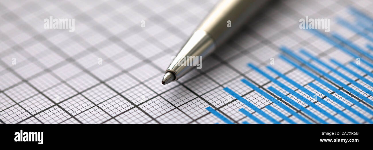 Silver pen lies on paper documents with color Stock Photo Alamy