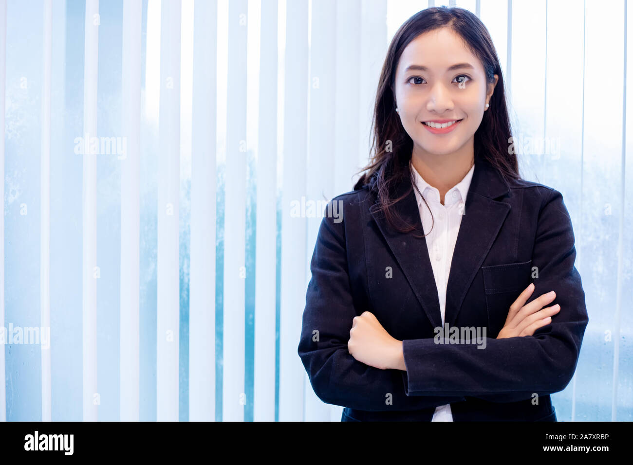 Asian business women and group using notebook for meeting and business women smiling happy for working Stock Photo