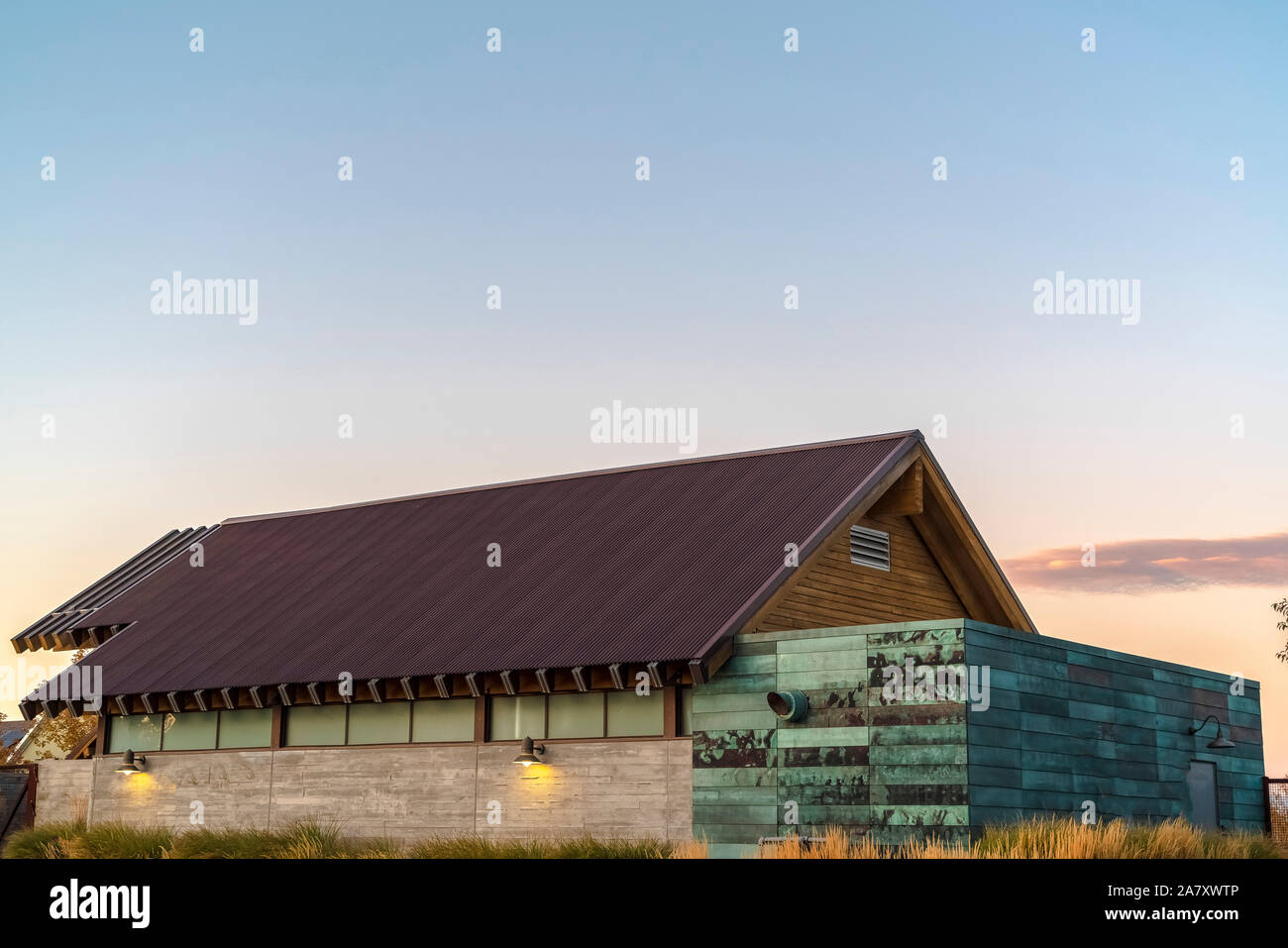 Building with gable roof and decorative wall Stock Photo - Alamy