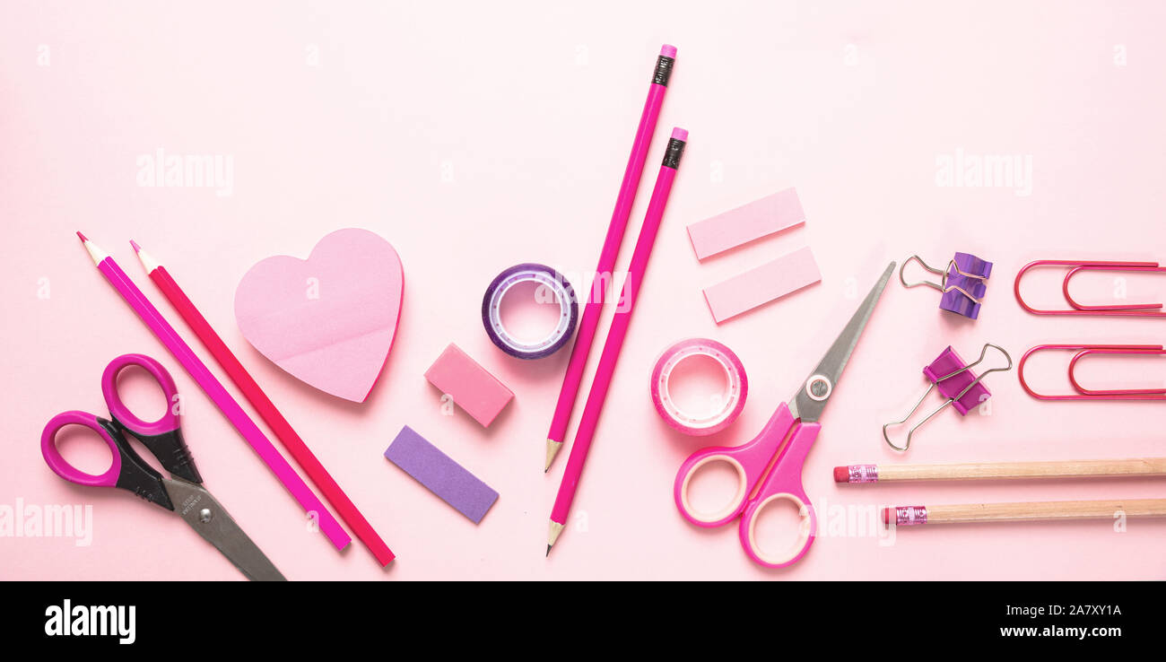 Flat lay of office, school stationery on pink background Stock Photo by  rawf8