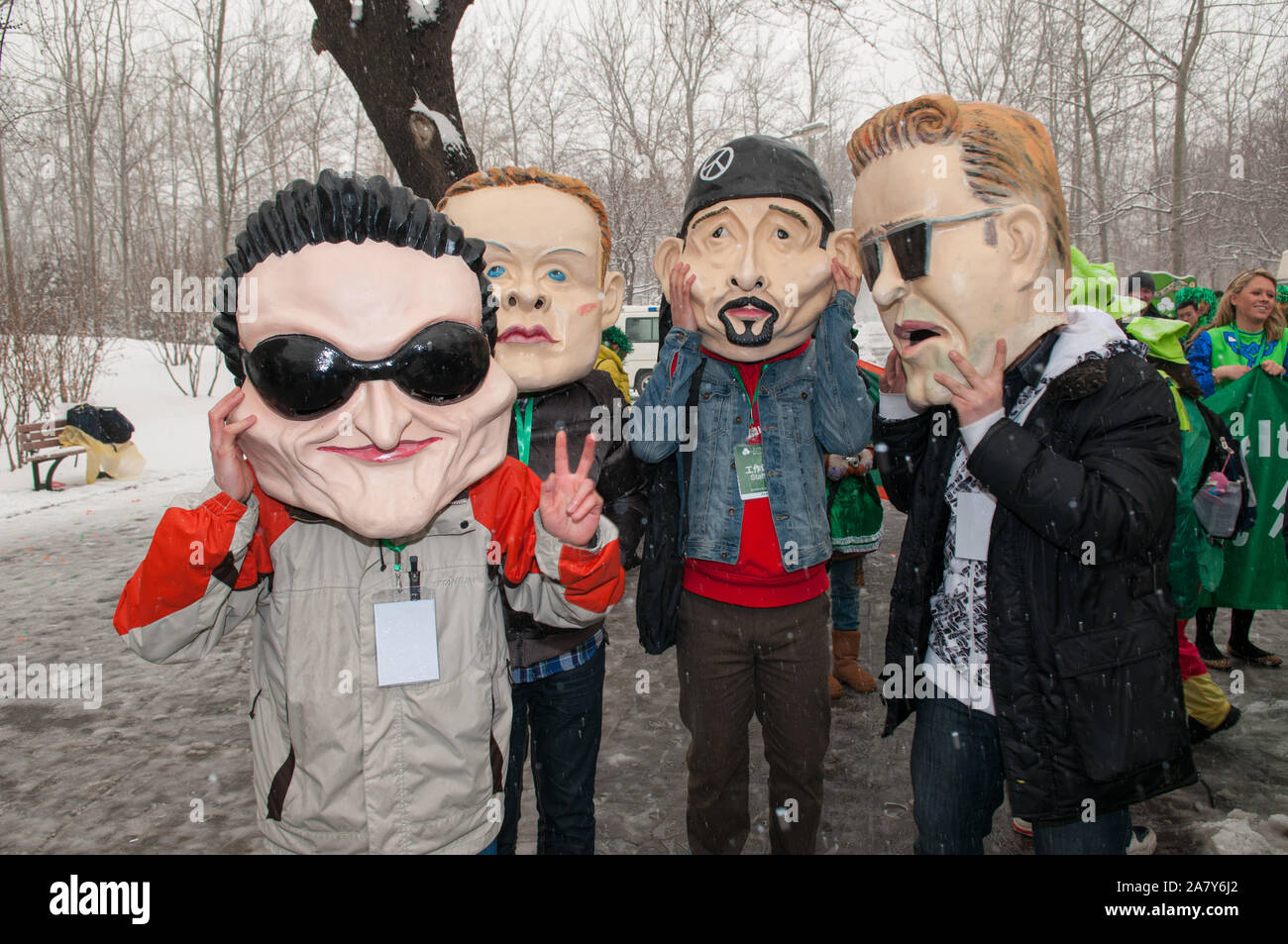 Oversized  masks of Irish band U2 at a St Patrick festival, Beijing, China. Stock Photo