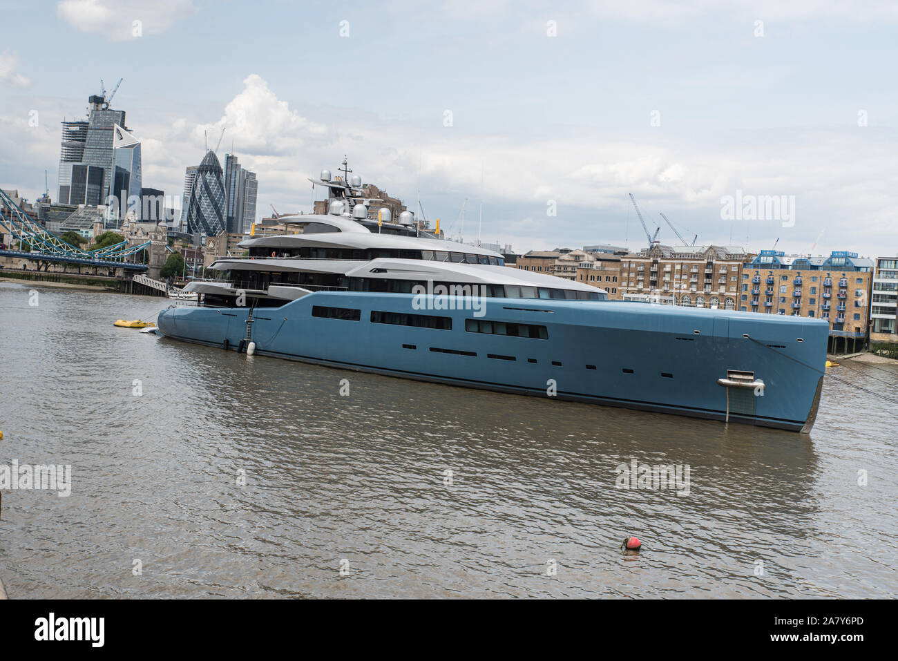 The yacht Aviva III moored on the River Thames near Tower Bridge belongs to businessman Joe Lewis. Stock Photo