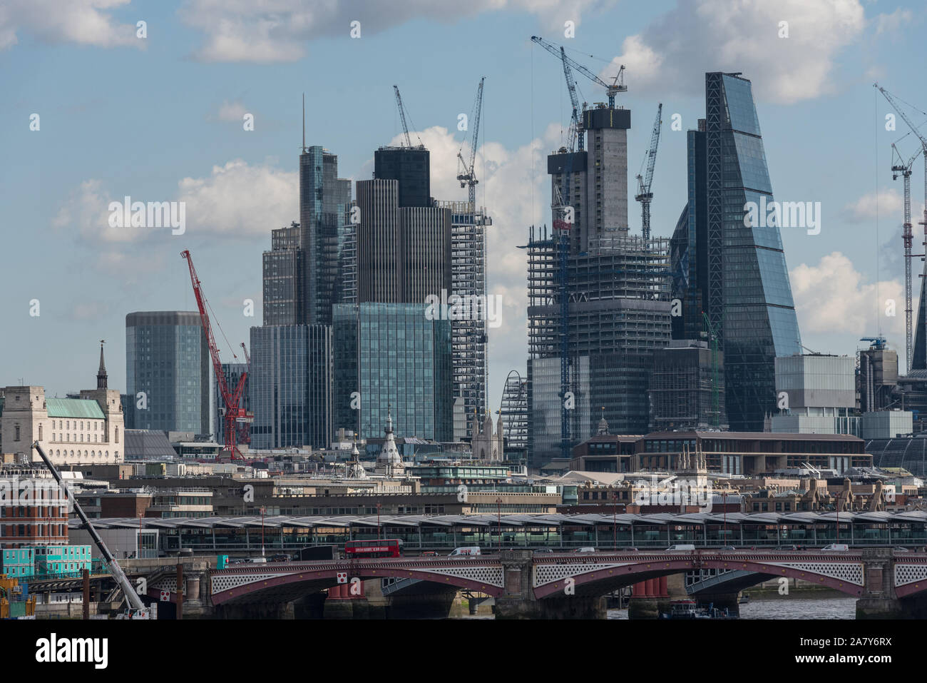 New buildings go up in the Square Mile seen from Waterloo bridge, London, UK. Stock Photo