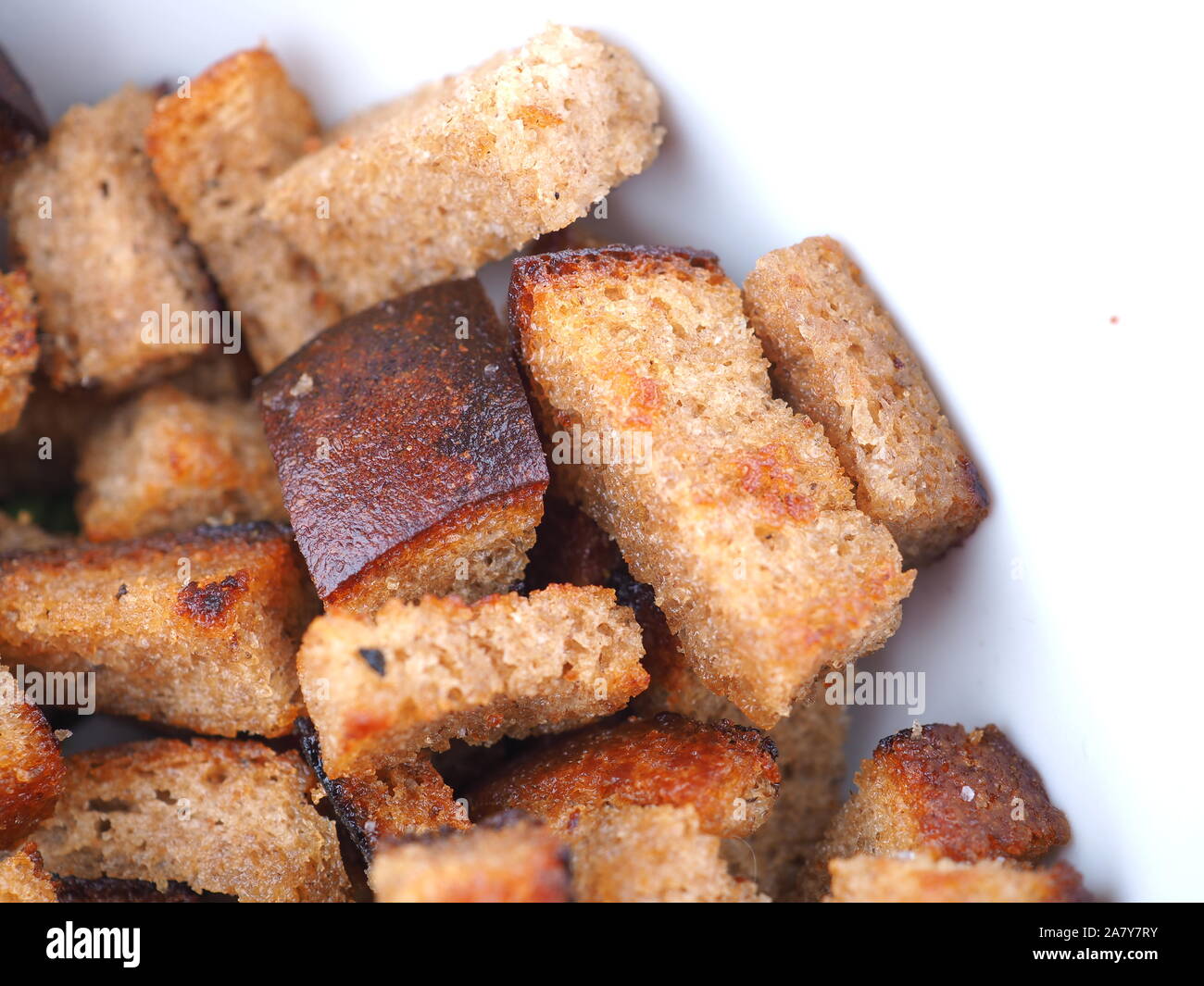 fried croutons on a white background Stock Photo Alamy