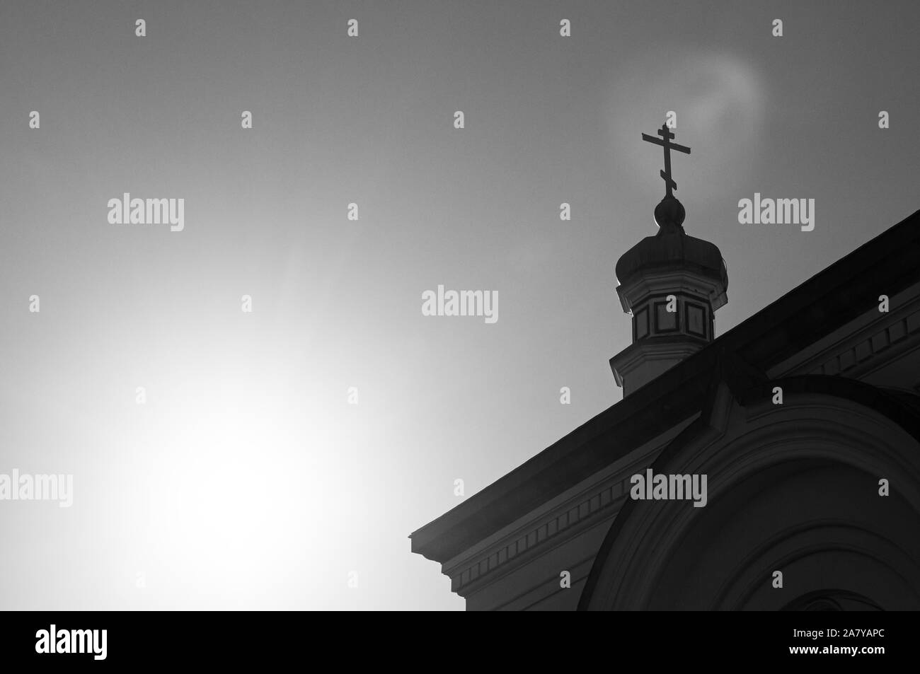 Hakodate Orthodox Church - Russian Orthodox church silhouette onion domes tower in winter under clear sky. Motomachi - Hakodate, Hakkaido. Black and w Stock Photo