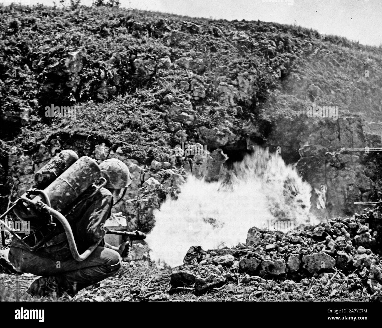 Japanese sniper in a burian tomb using for a snipers nest is burned by ...