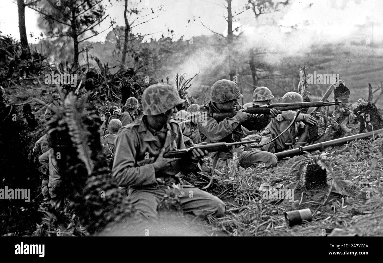 Orig Cap - Battle for a ridge where - a - company of 2nd Bat., fifth Marines were held up for 48 hours. Finally successful. Two miles from Naha. Stock Photo