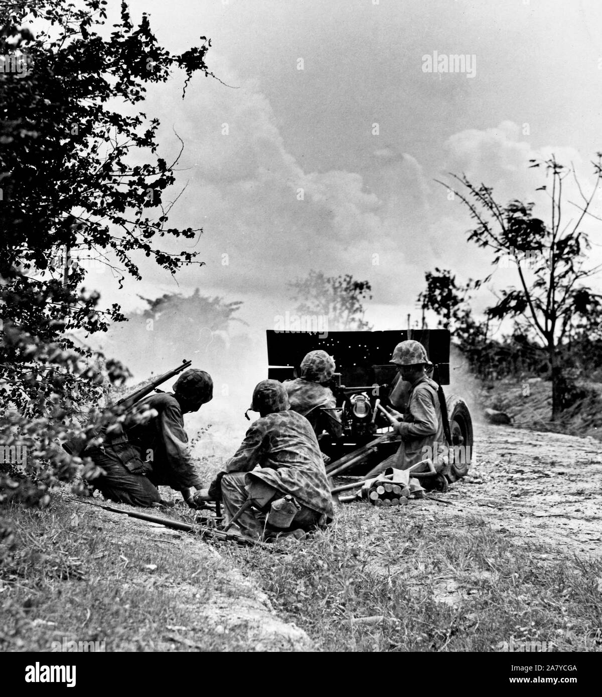 Marines fire rounds from 37mm gun on Saipan Stock Photo