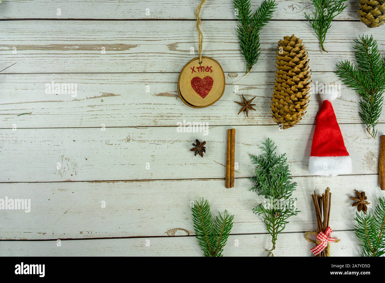 flat lay christmas composition on white wooden background . Stock Photo