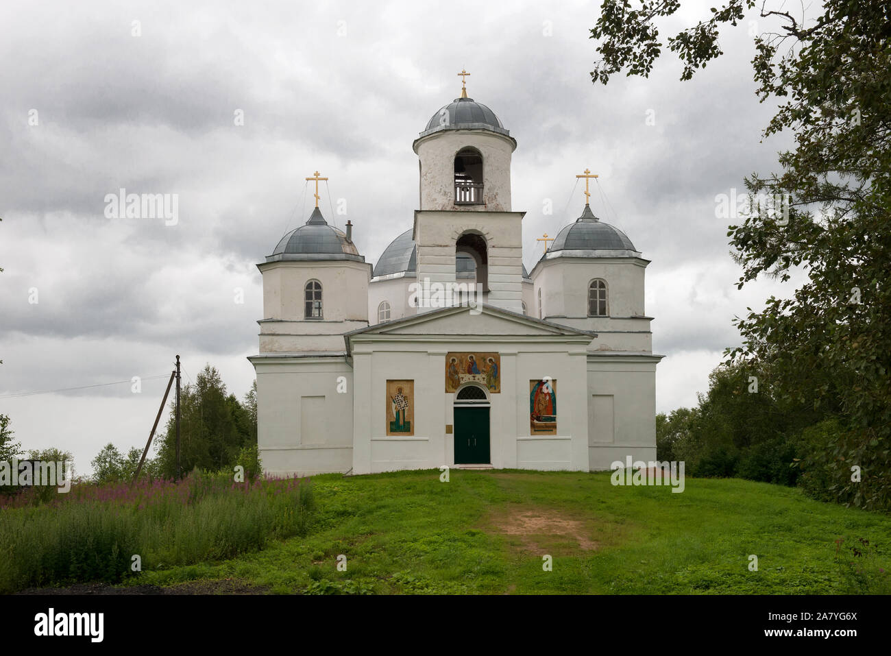 Orthodox church with frescoes on the wall in rainy weather Stock Photo ...