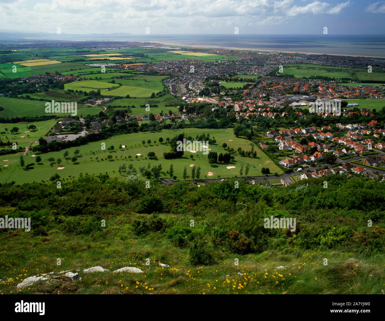 View west from Offa's Dyke path along the North Wales coast, over the Golf course and suburbs of Prestatyn, Denbighshire, North Wales. Stock Photo