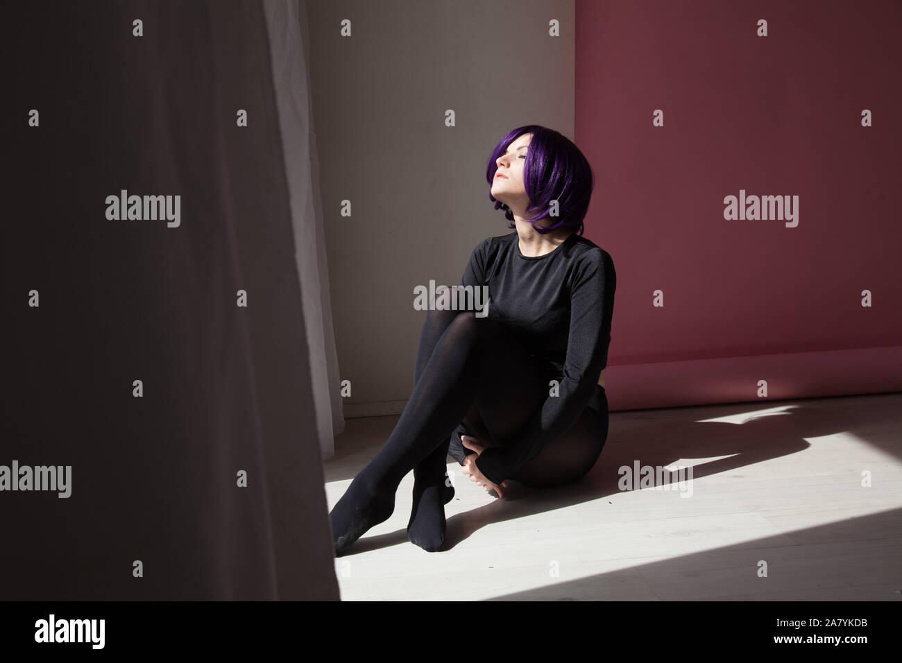 fashionable woman with purple hair anime Japan cosplay Stock Photo - Alamy