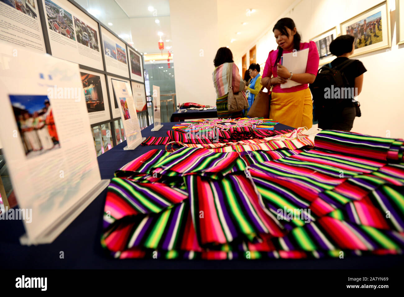 Yangon, Myanmar. 5th Nov, 2019. People view exhibits at an exhibition