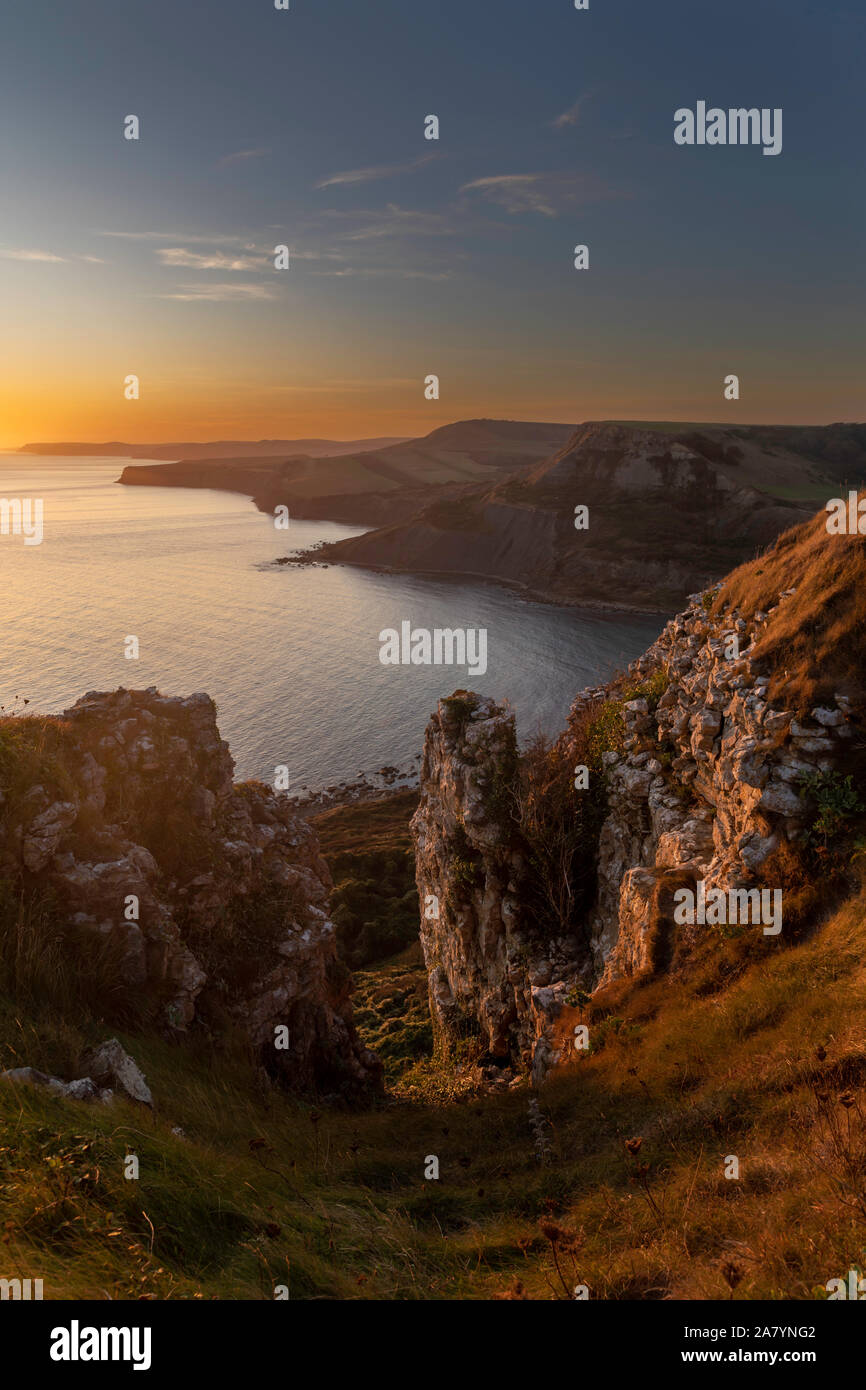 Chapman's Pool Dorset Engand View of Dorset's Jurassic coast from the cliffs above Chapman's Pool at sunset Stock Photo