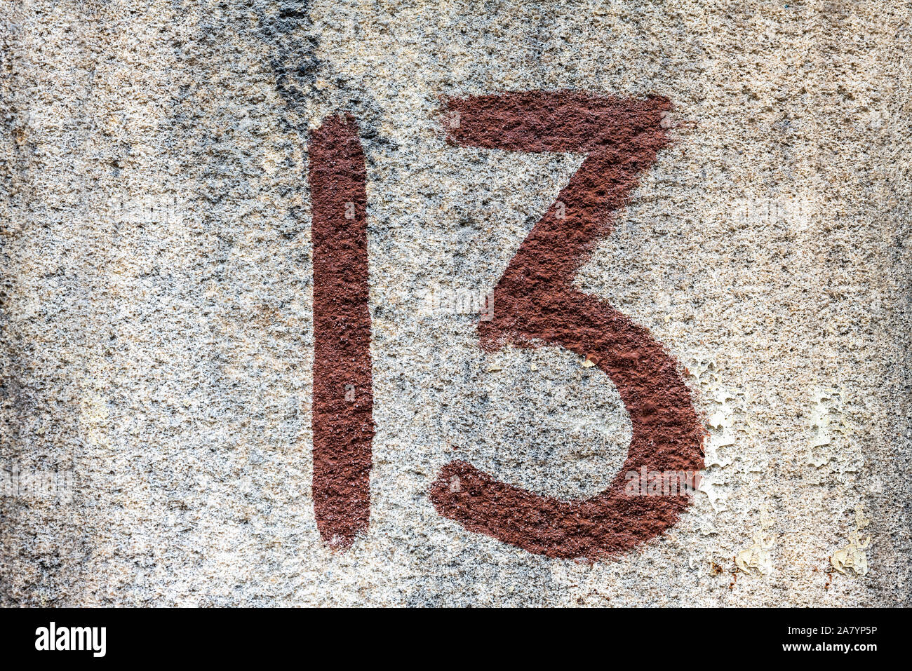 Street number sign on the wall Stock Photo - Alamy