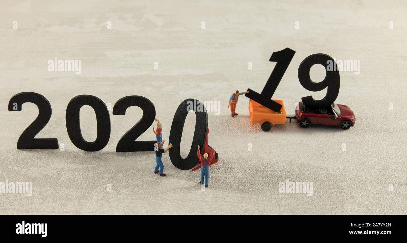 little people working at the new 2020 and remove the 2019 letters Stock Photo
