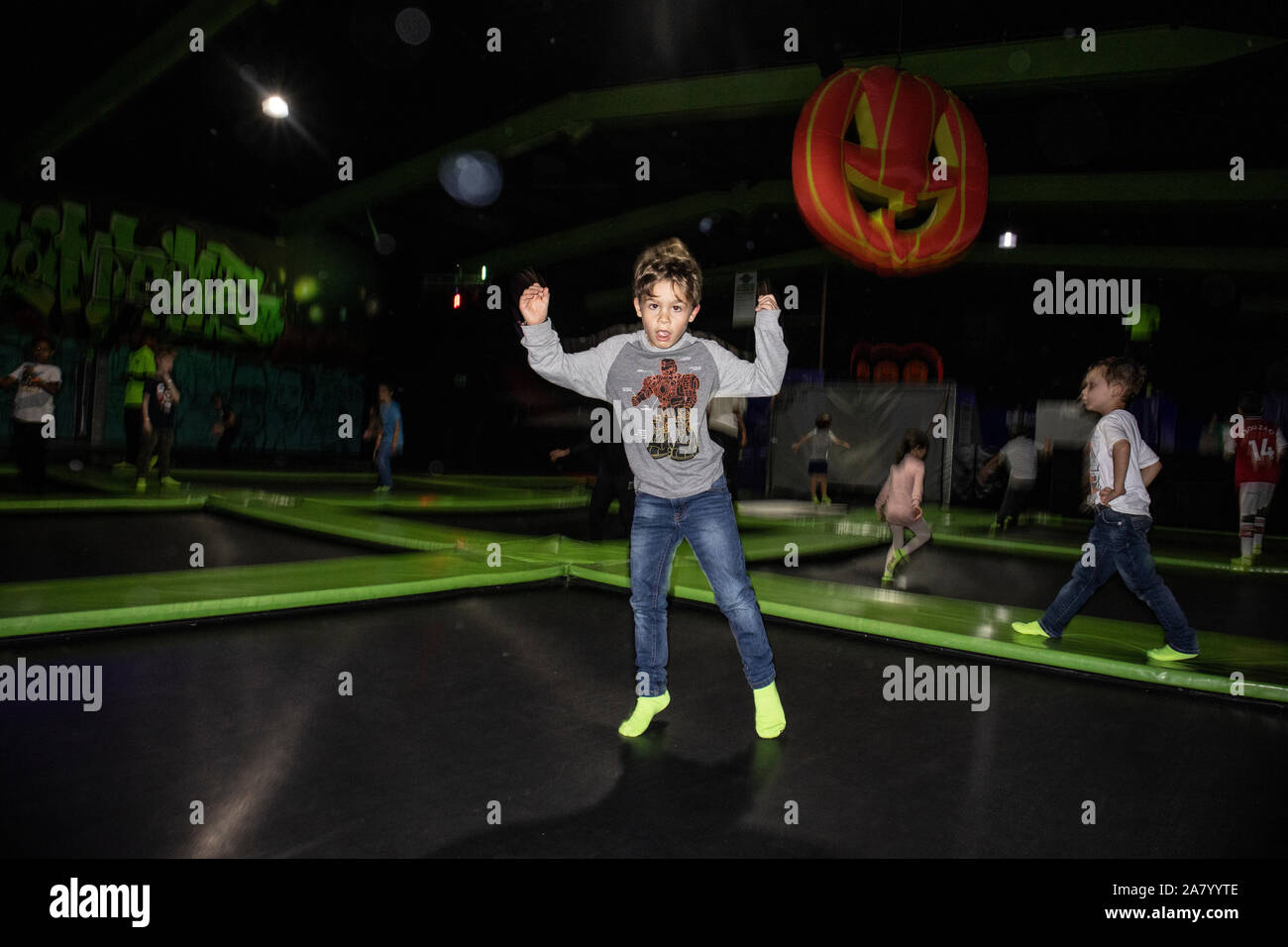 Ideel trojansk hest annoncere 6 year old boy bouncing on a trampoline at 'Flip Out London', situated in  Wandsworth, London's biggest trampoline park, England, UK Stock Photo -  Alamy