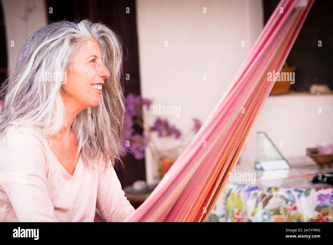 Cheerful Beautiful Aged Adult Woman With Long Grey And White Hair